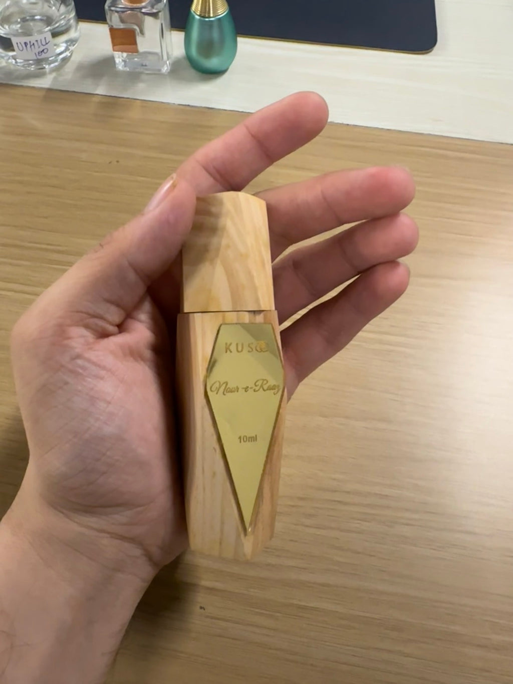 Anbar attar bottle — wooden geometric hexagonal with gold diamond label
