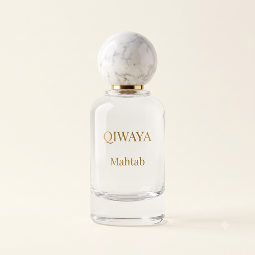 QIWAYA Mahtab eau de parfum — clear glass bottle with white marble sphere cap